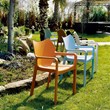 Compamia Diva Resin Outdoor Patio Dining Arm Chair in Orange
