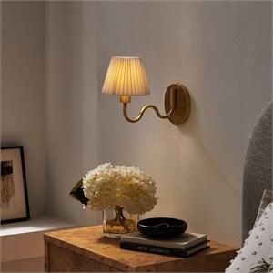 wave squiggle arm wall sconce in brass