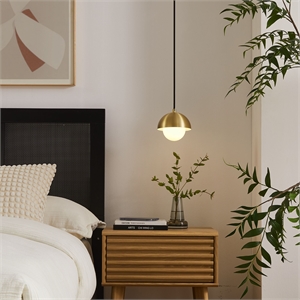 eclipse globe pendant light in brass
