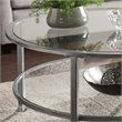 SEI Furniture Jaymes Round Glass Top Coffee Table in Silver