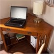 SEI Furniture Wood Corner Computer Desk in Mission Oak with Gun Metal Handles