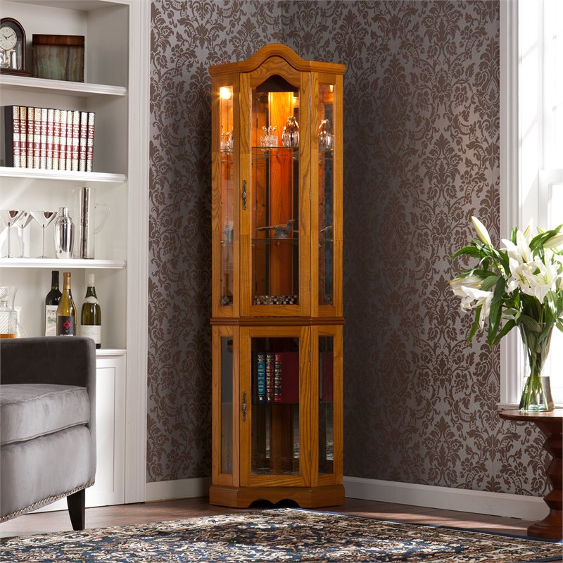 SEI Furniture Riley Lighted Corner Curio Cabinet in Golden Oak