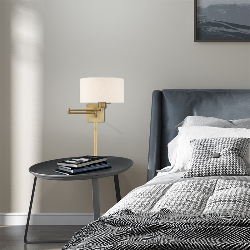 Livex Lighting 1-Light Swing Arm Modern Metal Wall Lamp in Antique Brass/Oatmeal