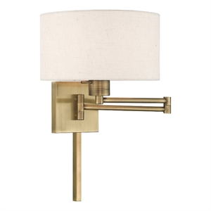 Livex Lighting 1-Light Swing Arm Modern Metal Wall Lamp in Antique Brass/Oatmeal
