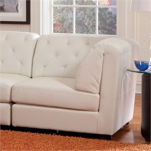bowery hill faux leather tufted corner chair in white