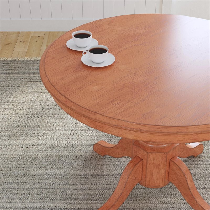 Bowery Hill Round Pedestal Dining Table in Cottage Oak