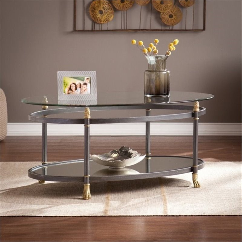 Bowery Hill Oval Glass Top Coffee Table in Gold | Cymax Business
