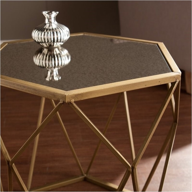 bowery hill geometric accent end table in gold with antique mirror