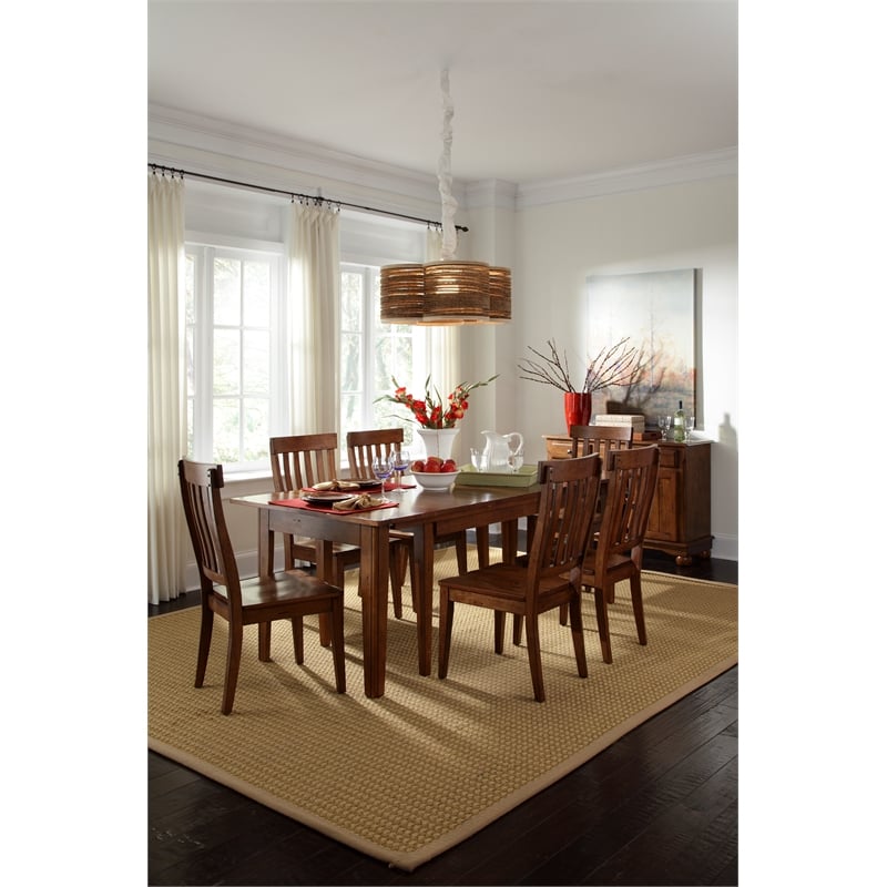 Bowery Hill Solid Wood Extendable Dining Table in Rustic Amber