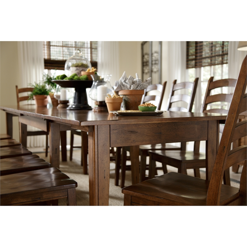 Bowery Hill Solid Wood Extendable Dining Table in Rustic Amber