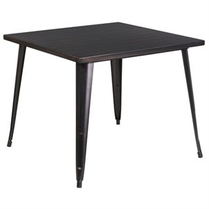 bowery hill metal dining table in black and antique gold