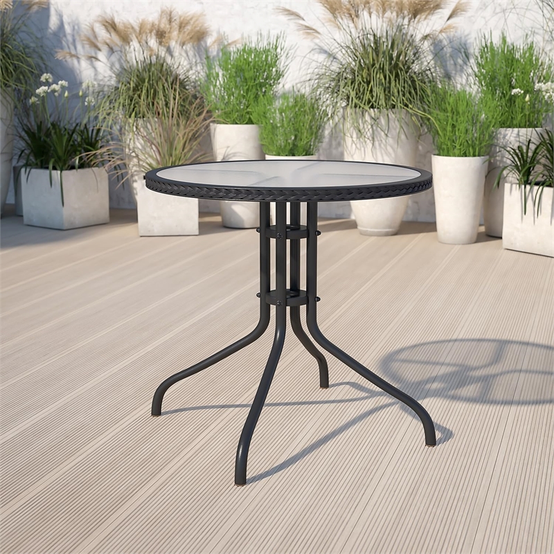 Bowery Hill Glass/Rattan Round Top Patio Dining Table in Black
