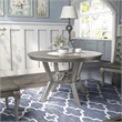 Bowery Hill Transitional Round Wood Dining Table in Silver
