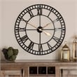 Bowery Hill Contemporary Black and Gold Finished Metal Wall Clock
