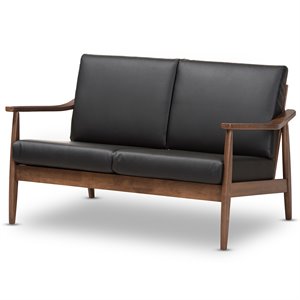 bowery hill faux leather loveseat in black and walnut brown