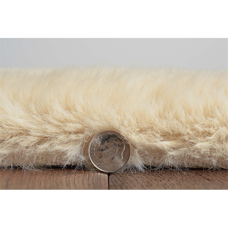 Bowery Hill Modern Faux Rabbit Polyester 8'x10' Area Rug in Tan