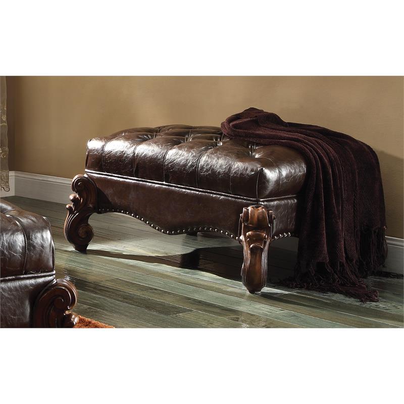 Bowery Hill Faux Leather Upholstered Ottoman in Dark Brown and Cherry Oak