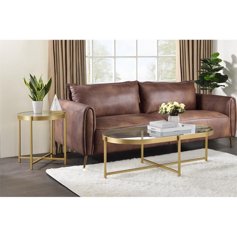 Bowery Hill Glass Top Coffee Table with Cross Bar Base in Clear Glass and Gold