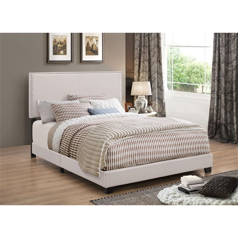 Bowery Hill Fabric Upholstered Queen Bed with Nailhead Trim in Ivory