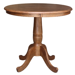 Bowery Hill Solid Wood Round Top Pedestal Table in Distressed Oak - 29.1&quot Height