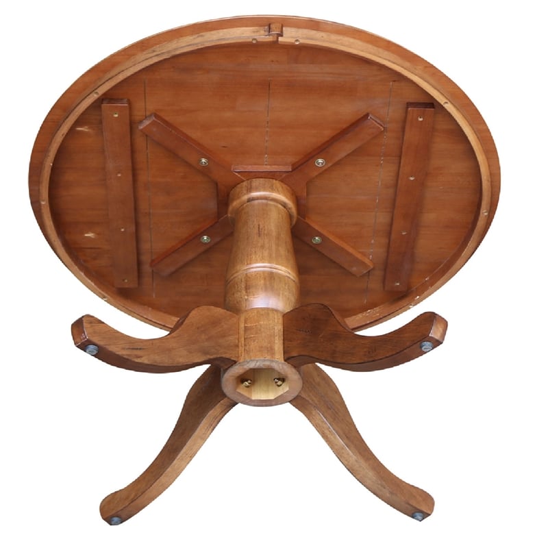 Bowery Hill Solid Wood Round Top Pedestal Table in Distressed Oak - 29.1
