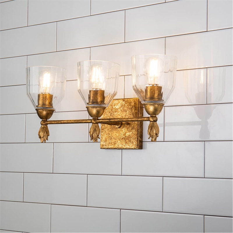 Bowery Hill 3-light Flame-shaped Bath Vanity Light in Antique Gold