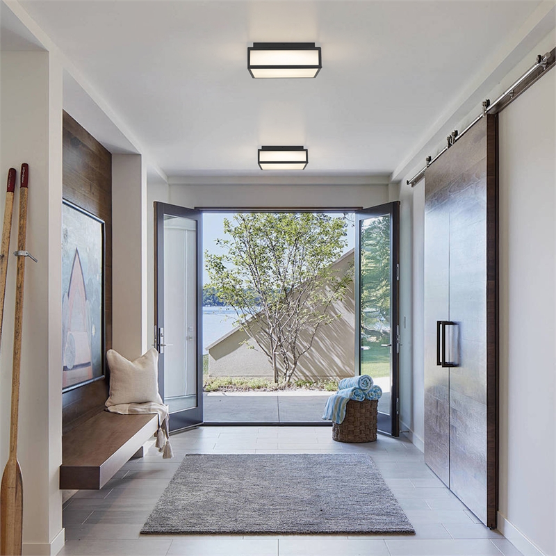 Bowery Hill Modern Stainless Steel 10-inch LED Outdoor Flush Mount in Black