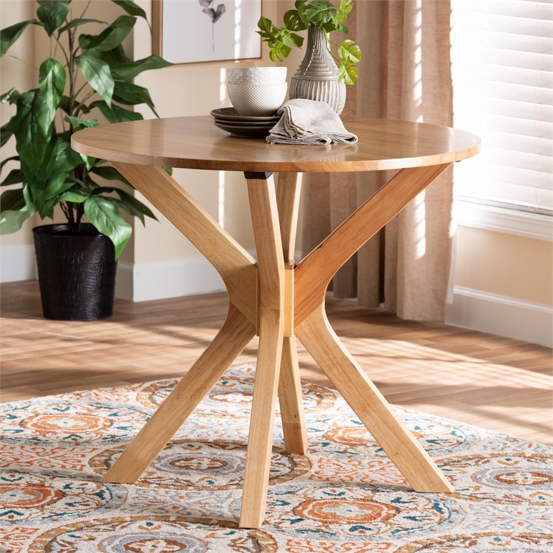 Bowery Hill Round Wood Dining Table with Splayed Legs in Brown