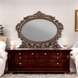 Bowery Hill Oval Mirror with Scrolled Frame in Rich Cherry Finish