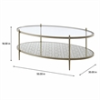 Bowery Hill Metal and Tempered Glass Oval Coffee Table in Silver
