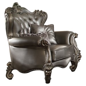 Bowery Hill Wing Back Chair in Silver Faux Leather with Antique Platinum Trim