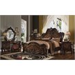 Bowery Hill Arched Wood Queen Panel Bed in Cherry Oak