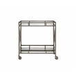 Bowery Hill Rectangular Metal Mirror Top Serving Cart in Antique Brass