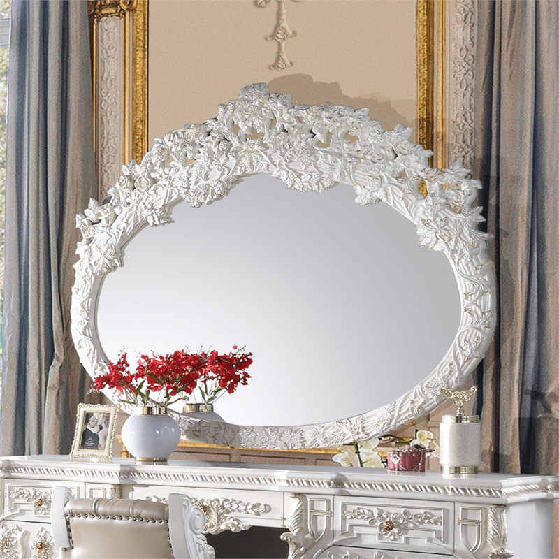 Bowery Hill Oval Wall Mirror with Scrollwork in Antique White