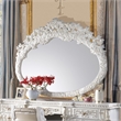 Bowery Hill Oval Wall Mirror with Scrollwork in Antique White