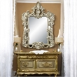 Bowery Hill Wall Mirror with Sculptural Scrollwork in Antique Gold