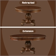 Bowery Hill Round Single Pedestal Dining Table with Removable Leaf in Cherry
