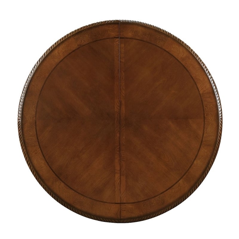 Bowery Hill Round Single Pedestal Dining Table with Removable Leaf in Cherry