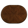 Bowery Hill Round Single Pedestal Dining Table with Removable Leaf in Cherry