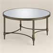 Bowery Hill Metal Coffee Table with Mirrored Top in Antique Brass