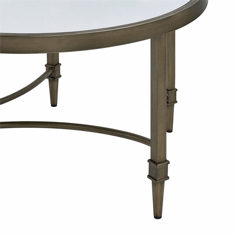 Bowery Hill Metal Coffee Table with Mirrored Top in Antique Brass