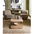 Bowery Hill Rectangle Cocktail Table with Brass Trim in Natural Wood