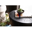 Bowery Hill Carved Resin Stump Side Table in Black with Geometric Design