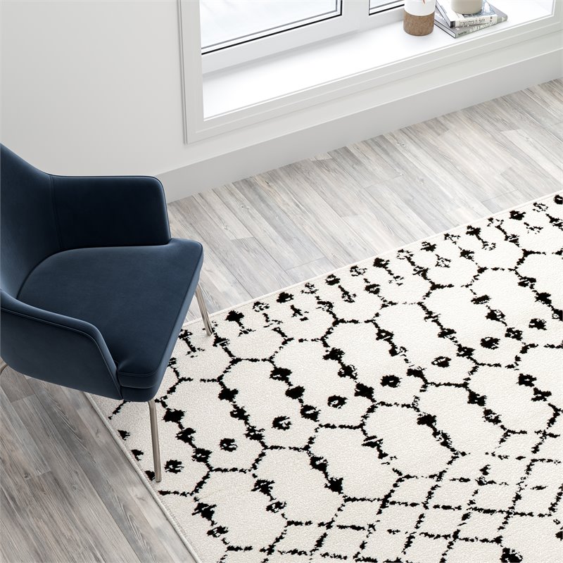 Bowery Hill 8' x 10' Geometric Polyester Area Rug in Ivory and Black