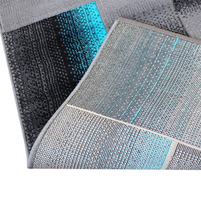 Bowery Hill 5' x 7' Geometric Area Rug in Turquoise Olefin Fabric