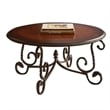 Pemberly Row Traditional Antique Metal Frame Round Wood Coffee Table in Cherry