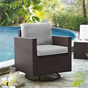Pemberly Row Wicker Patio Swivel Rocker with Gray Cushions