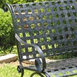 Pemberly Row Iron Patio Rocker Loveseat in Black
