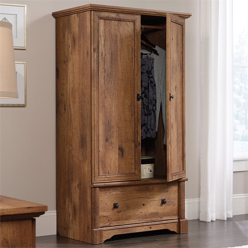 Pemberly Row Traditional Engineered Wood Bedroom Armoire with Garment Rod in Oak