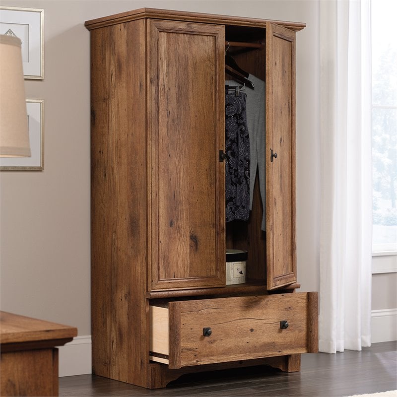 Pemberly Row Traditional Engineered Wood Bedroom Armoire with Garment Rod in Oak